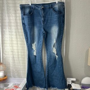Blue Flare Wide Leg Jeans with Distressed Details